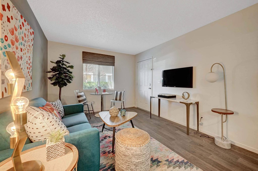 Living Room With TV at Solstice Apartment Homes, Nevada, 89108