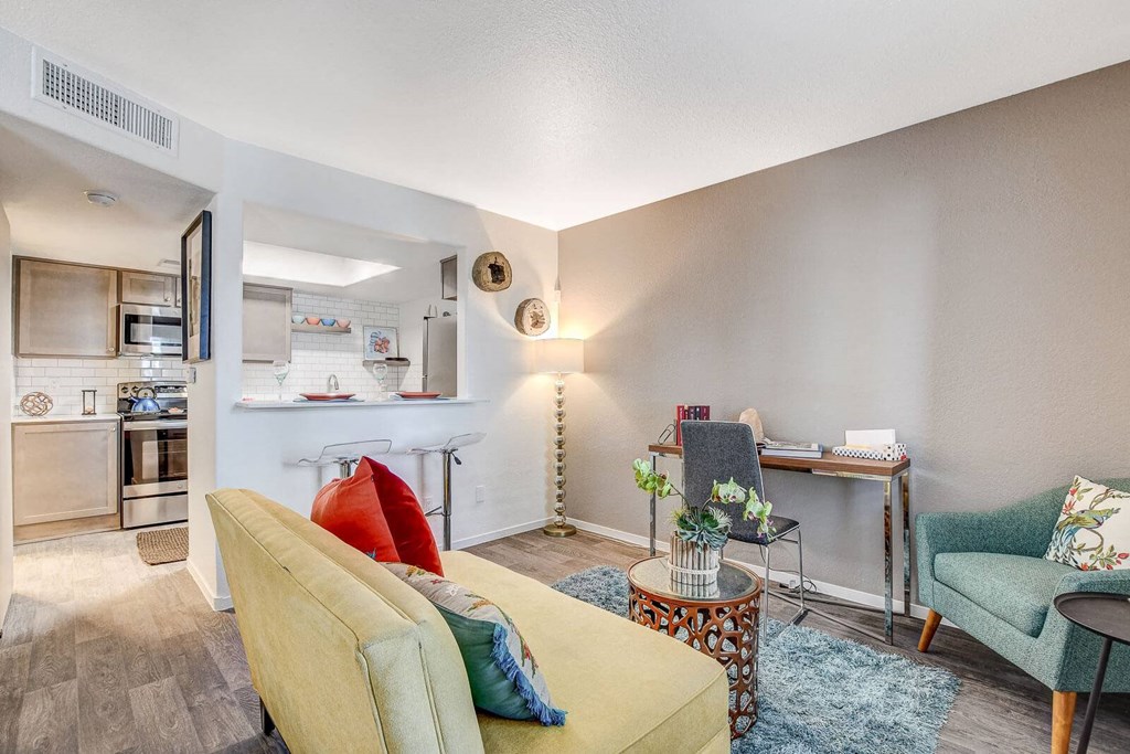 Living Room With Kitchen View at The 95 Apartments, Las Vegas, NV