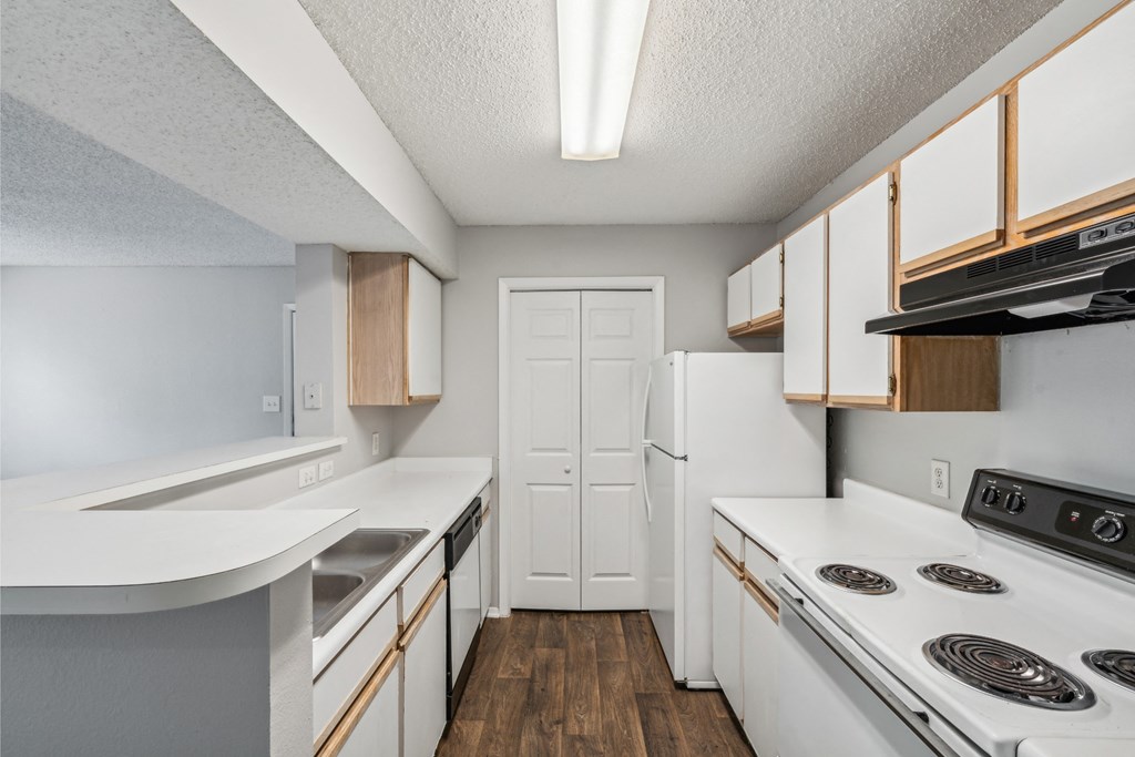 the preserve at ballantyne commons apartment kitchen with white appliances