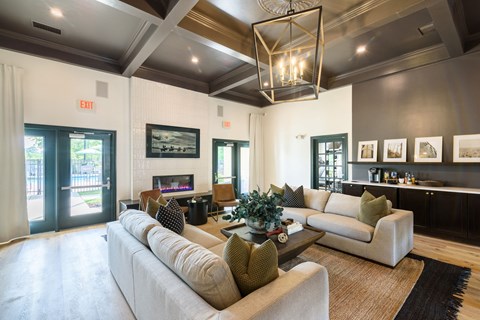 a living room with couches and a coffee table