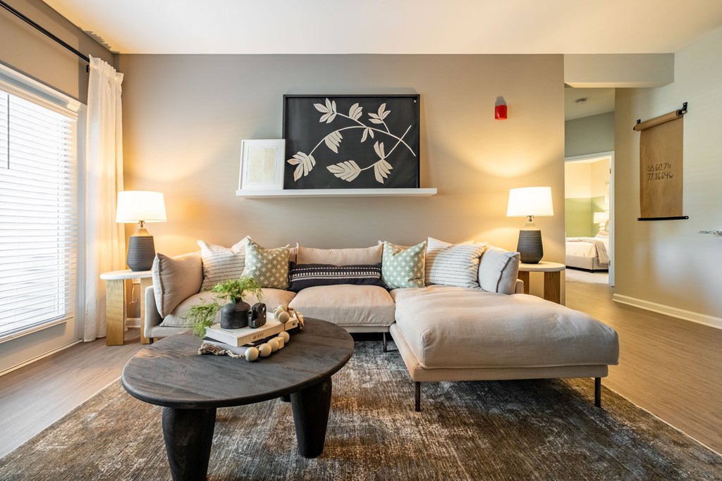 a living room with a couch and a coffee table
