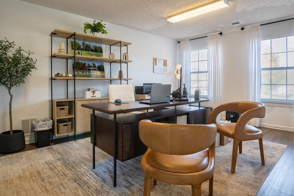 the preserve at ballantyne commons office space with a desk and chairs and a
