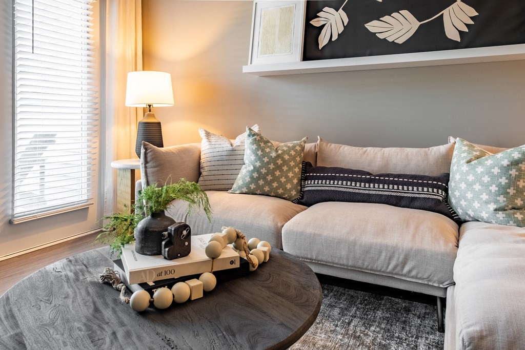 a living room with a couch and a coffee table