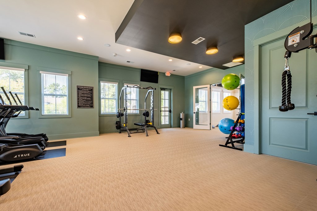 the gym at the flats at big tex apartments