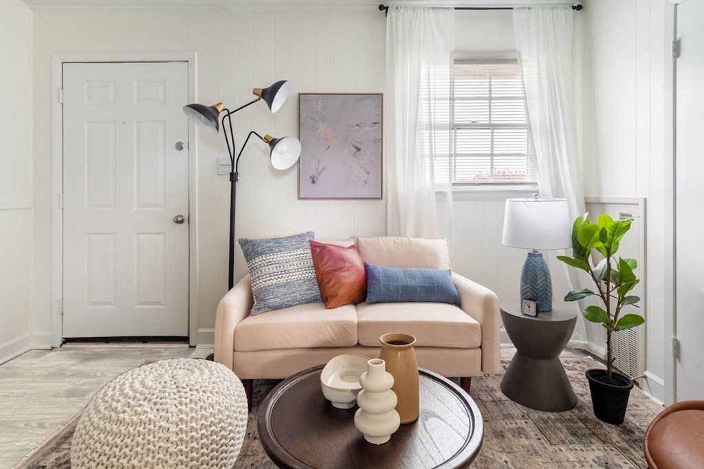 a living room with a couch and a coffee table