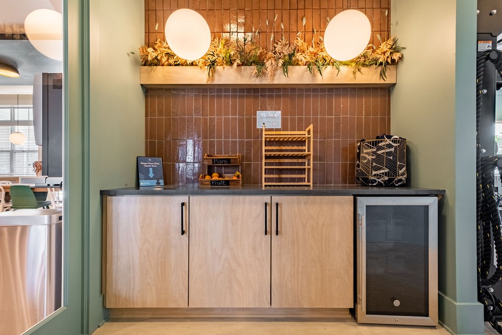 a kitchen with wooden cabinets and a counter top