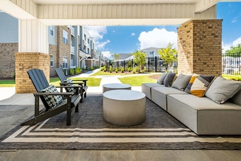 the preserve at ballantyne commons living room with couches and tables