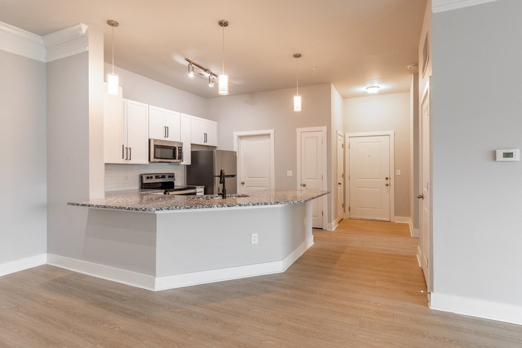 a view of a kitchen with a counter top and