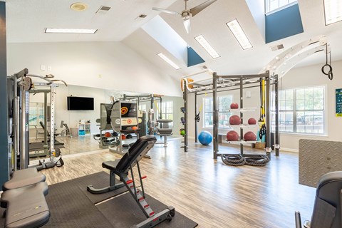 24-Hour Enhanced Fitness Center with Strength Training, Free Weights, and Cardio Equipment