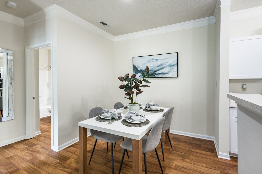 Home Interior a dining room with a table and chairs