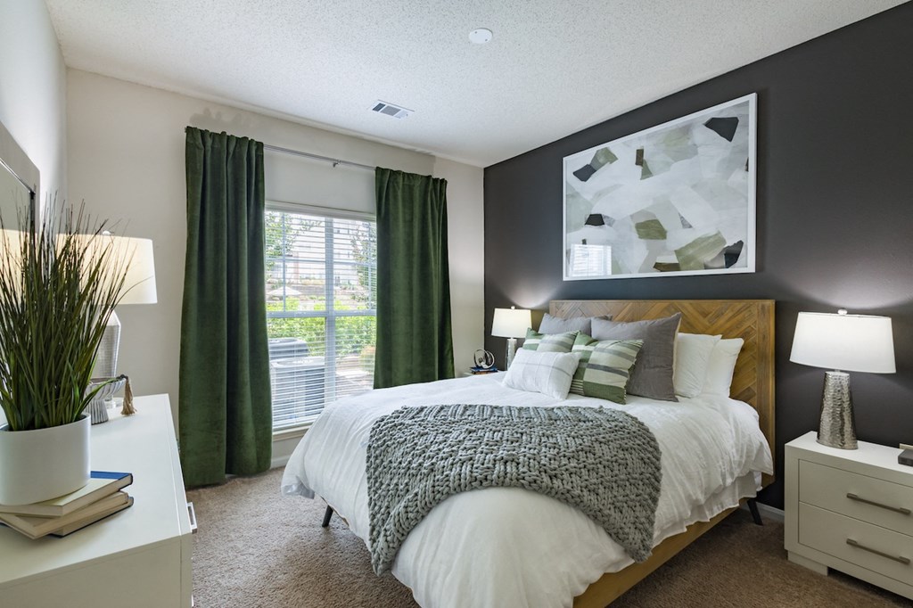 Home Interior our apartments offer a bedroom with a king sized bed