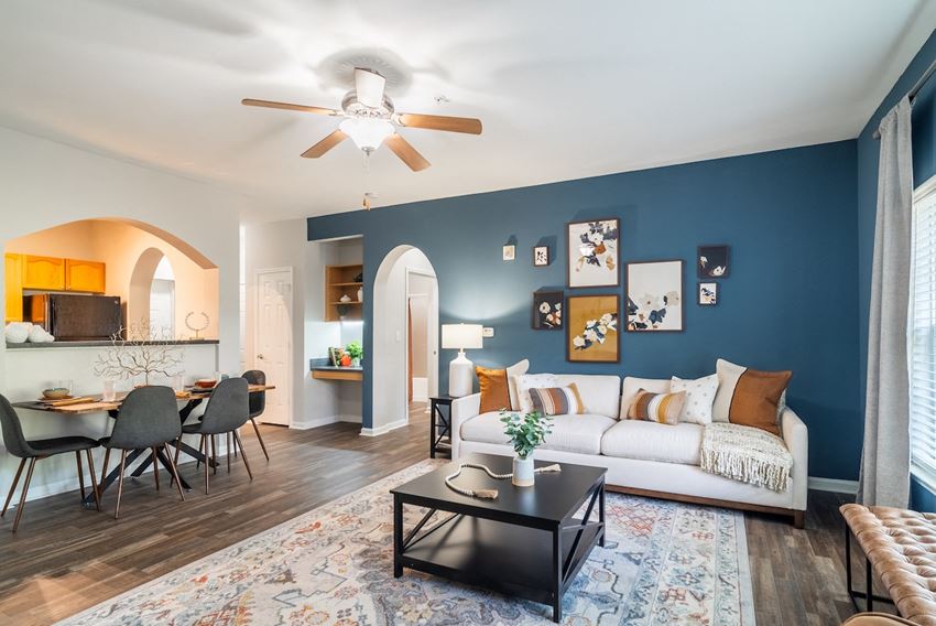 a living room with blue walls and a white couch - Photo Gallery