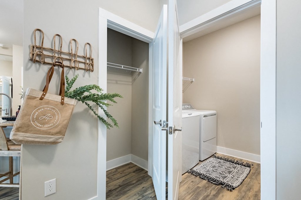 a small laundry room with a washer and dryer