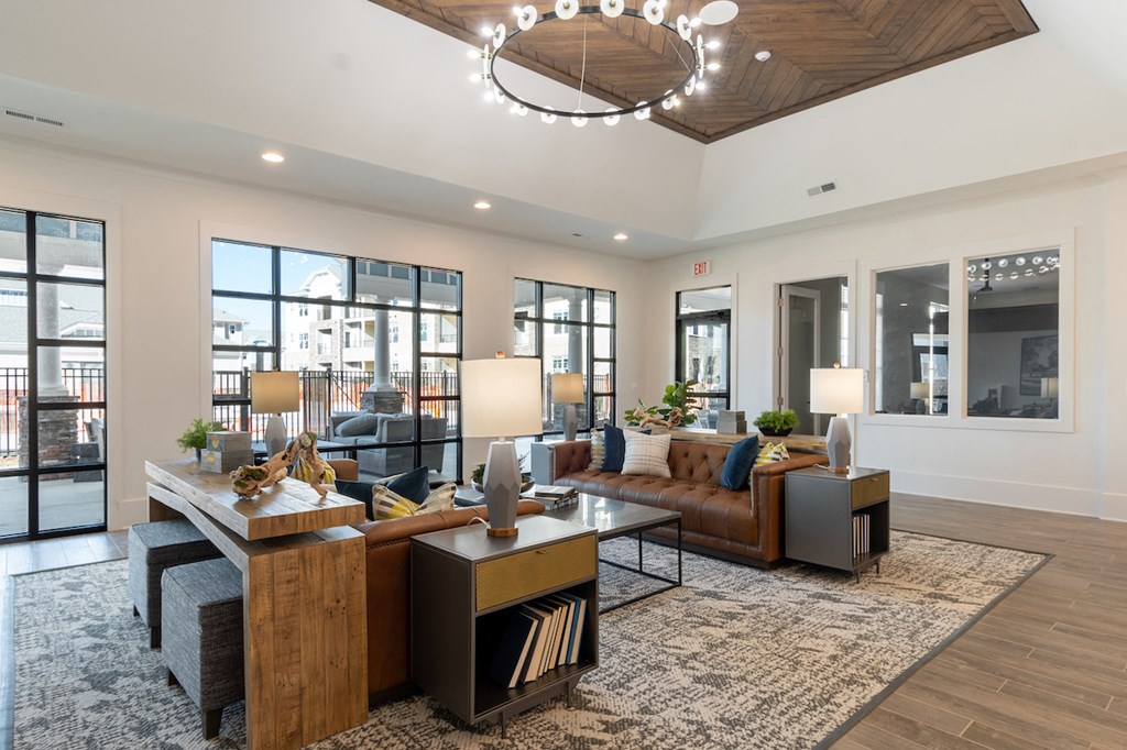 a living room with couches and a table