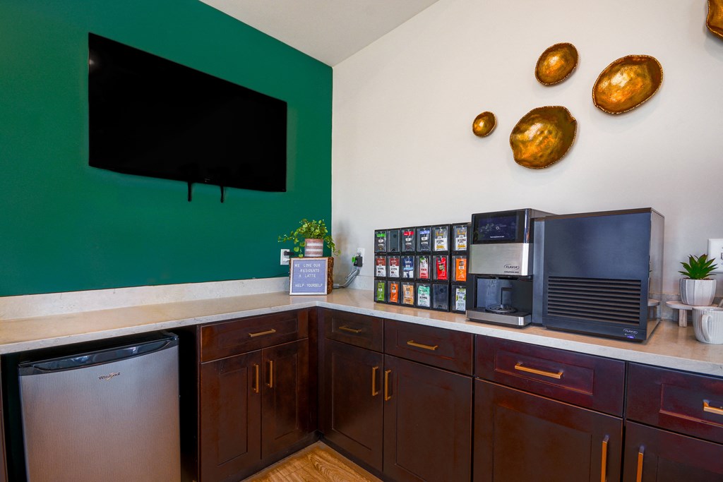 a restaurant with a bar and chairs in front of it