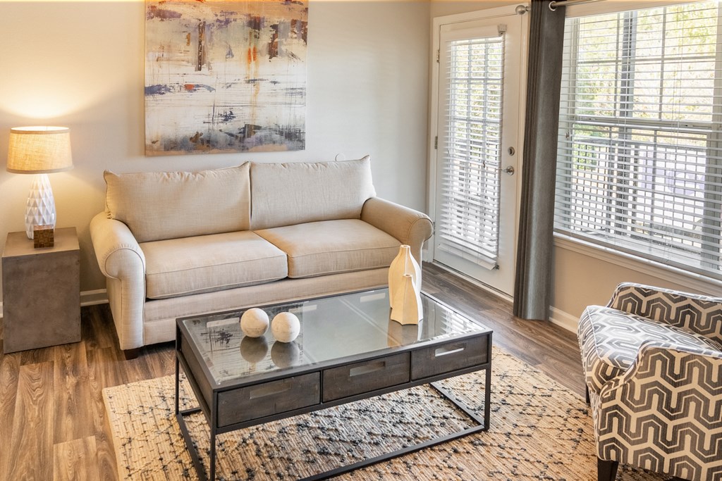 a living room with a couch and a coffee table