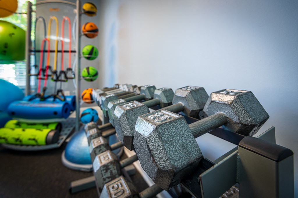 a gym with weights and other exercise equipment