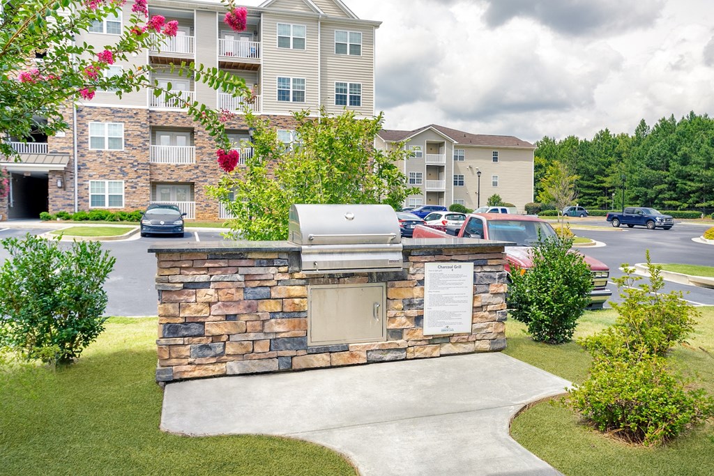 the estates at tanglewoodadministrative front view of building with outdoor grill