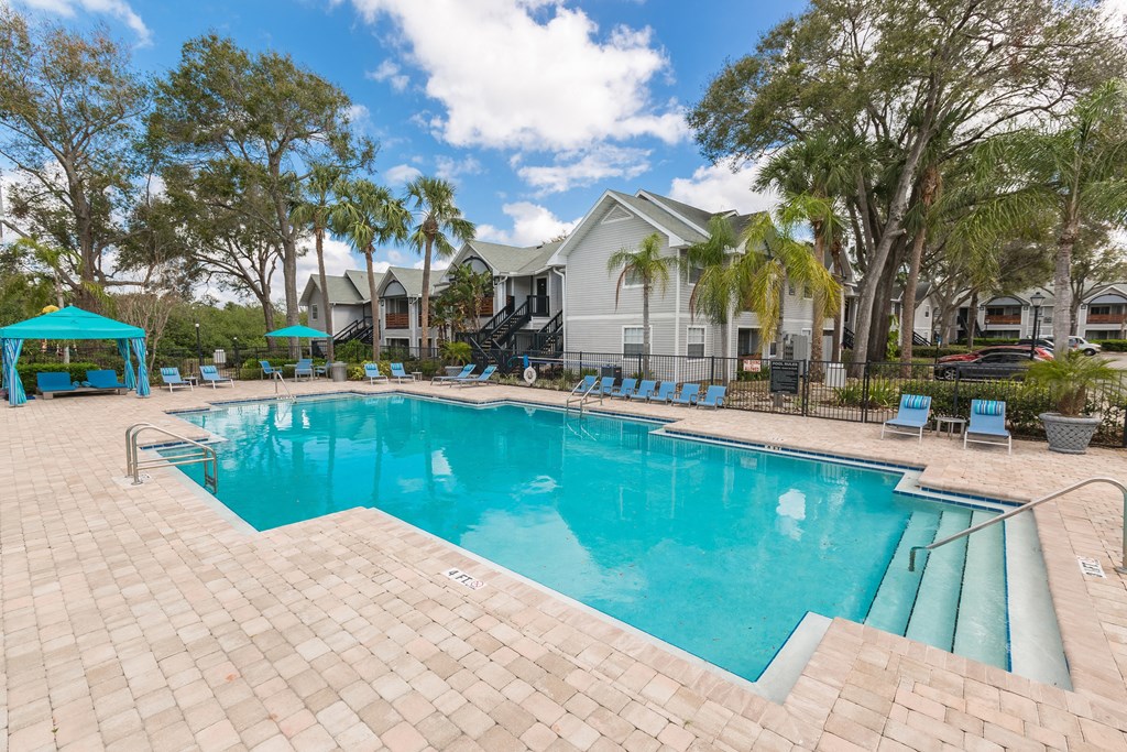 the swimming pool at the preserve at ballantyne commons apartments tx