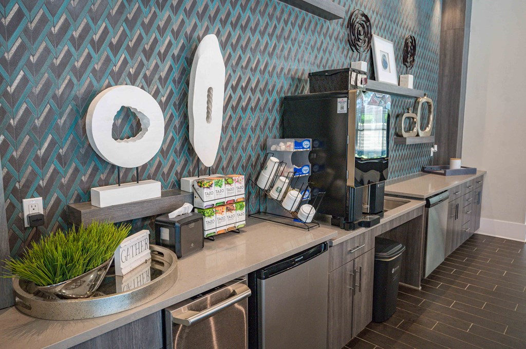 a coffee shop with a coffee machine and a mirror on the wall