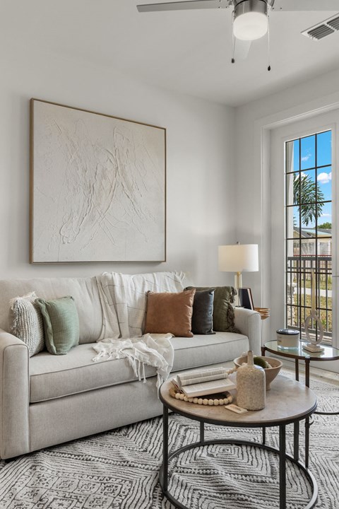 a living room with a couch and a table
