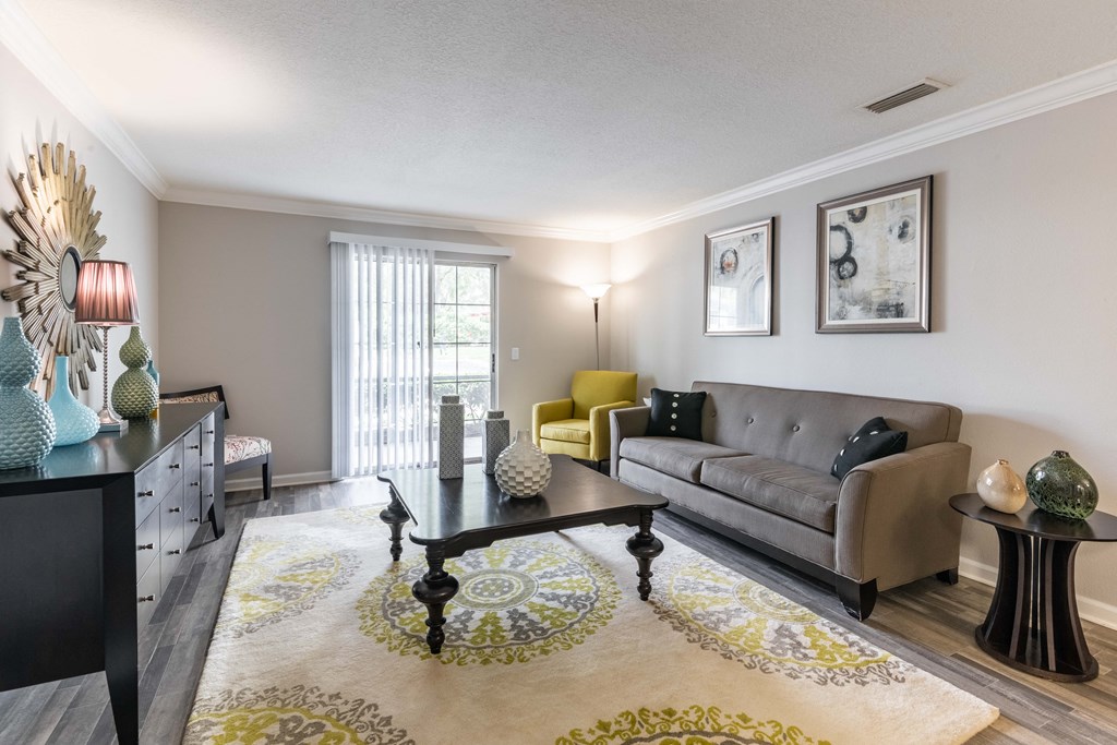 a living room with a couch and a coffee table