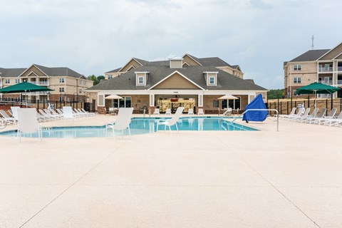 Building in the Background with Pool in Front of it.