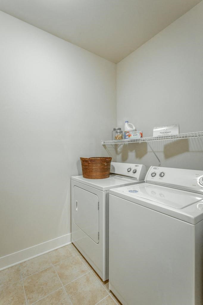 a white washer and dryer in a room