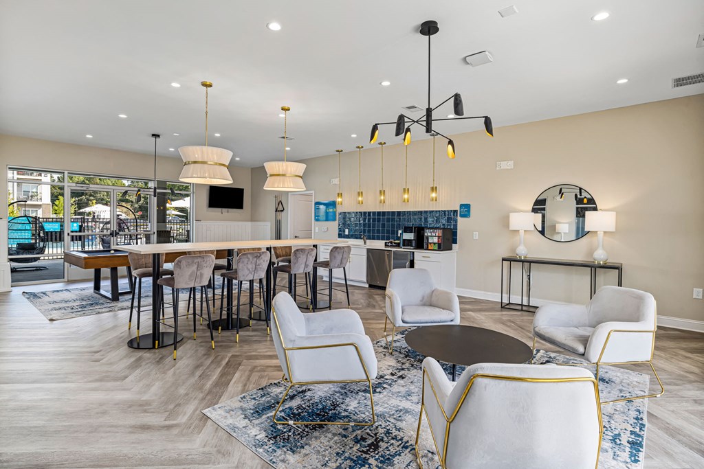 a living room with a kitchen and a dining room