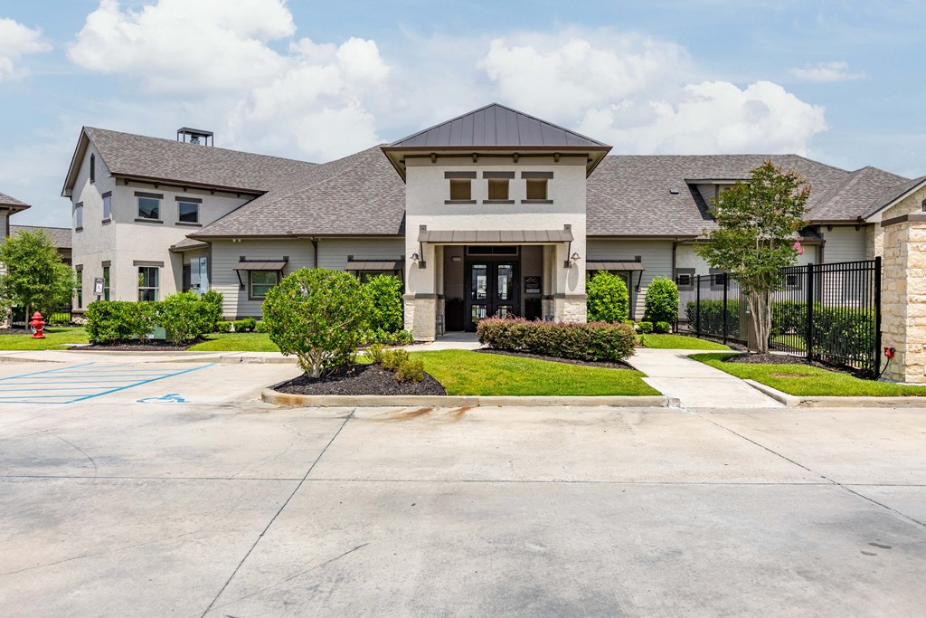 a large house with a driveway in front of it