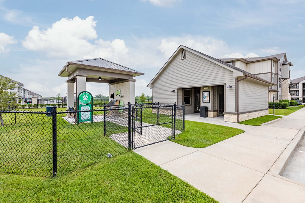 the preserve at ballantyne commons fenced in entrance to community with apartments