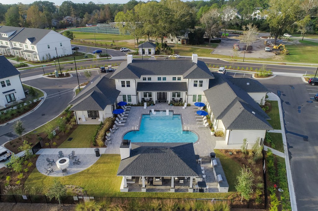 Serene Pool Courtyard with Fire Pit at Hawthorne at the Pointe Apartments