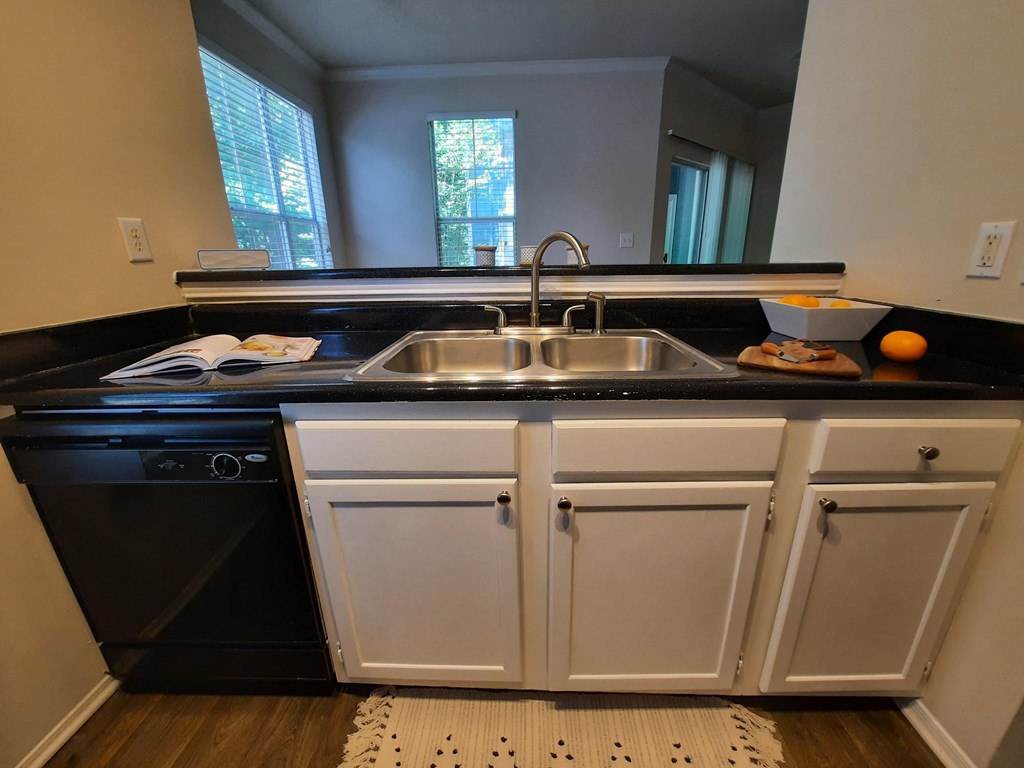 kitchen with white cabinets and new countertops