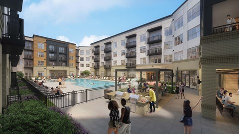 A group of people are gathered in a courtyard with a pool and a bar.