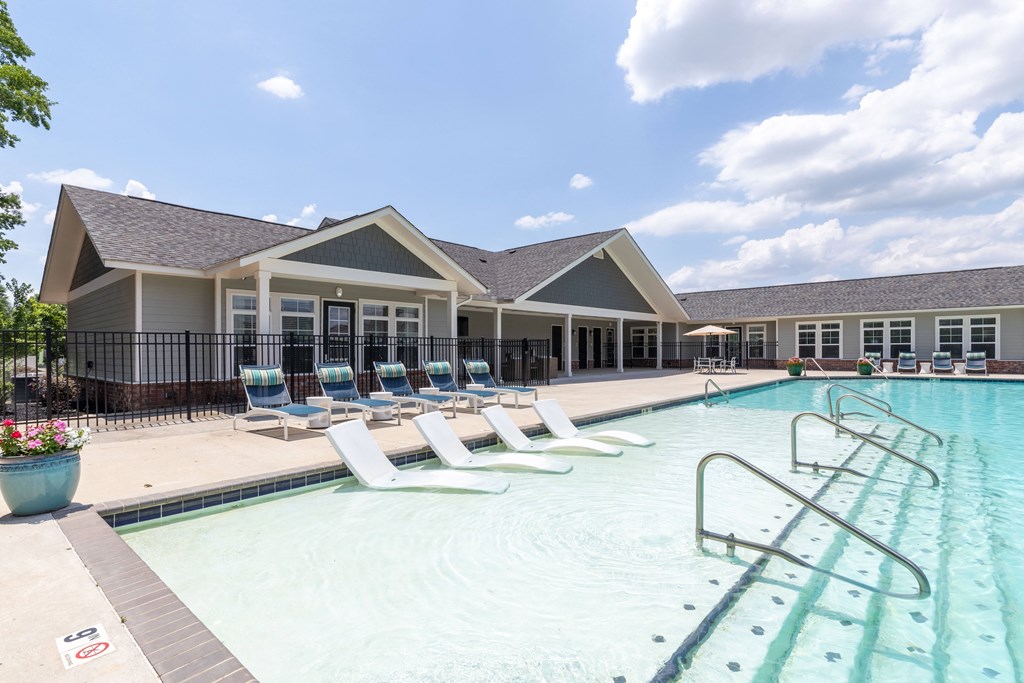 our apartments have a large resort style pool with lounge chairs