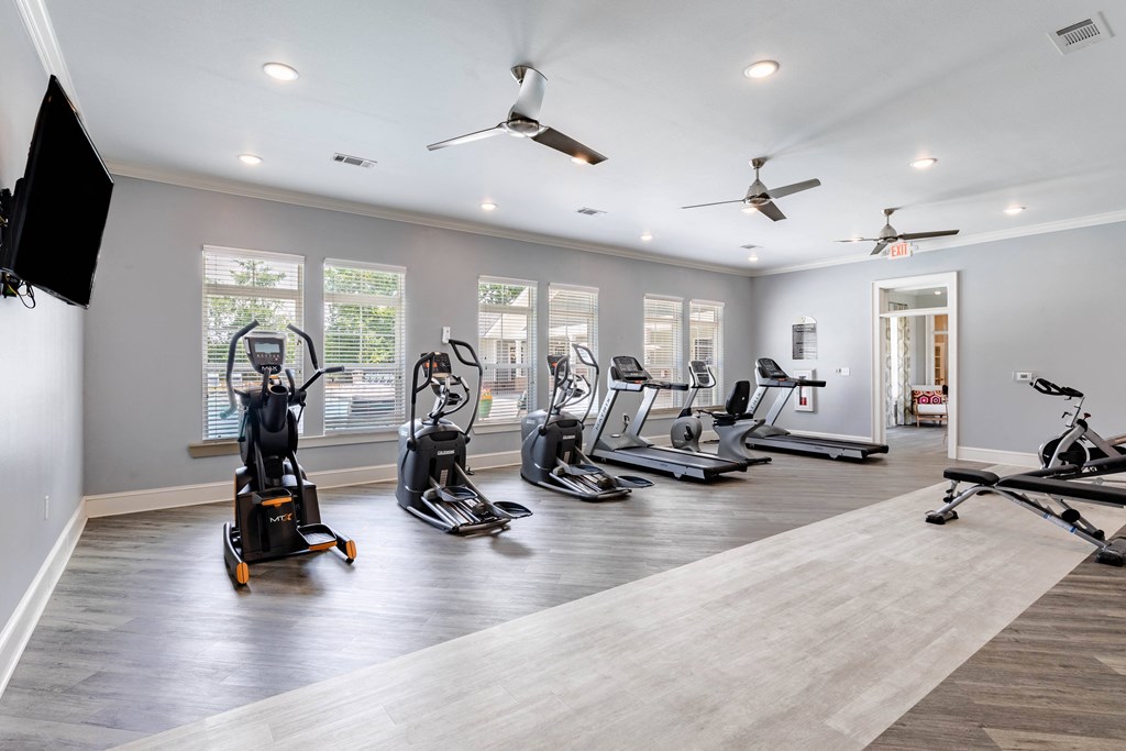 the gym has cardio equipment and treadmills in it