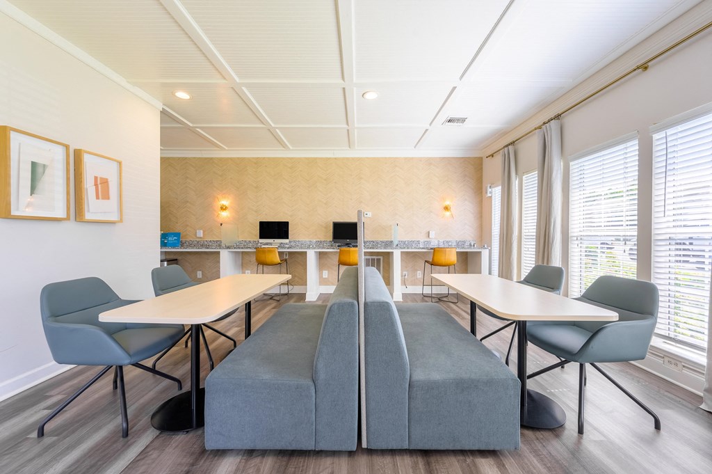 a counselling room with chairs and tables and a couch