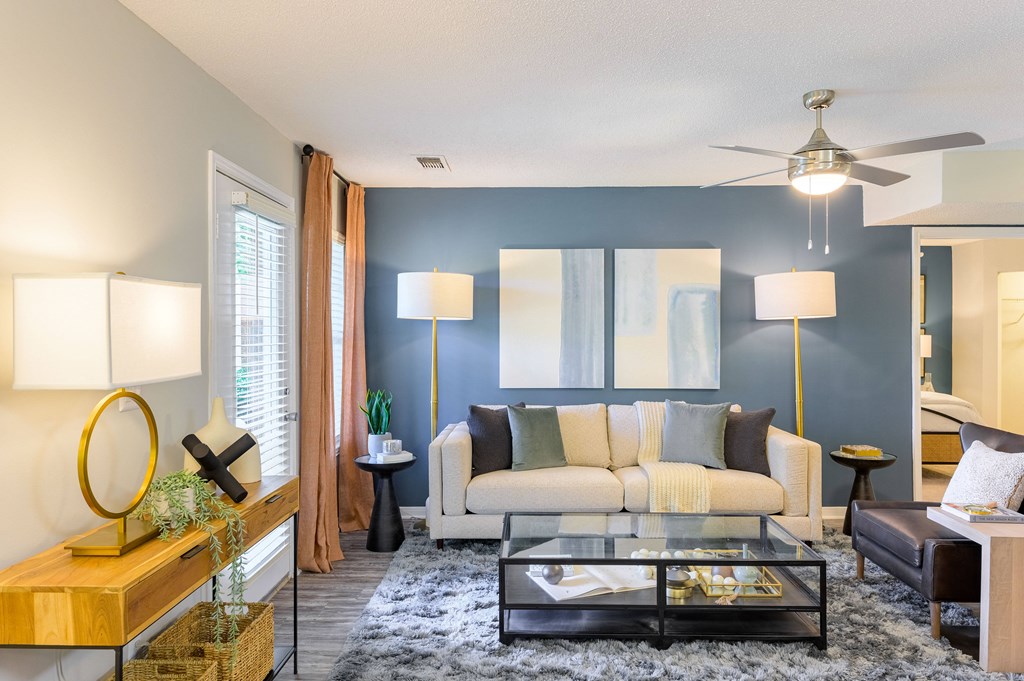 a living room with a couch and a coffee table