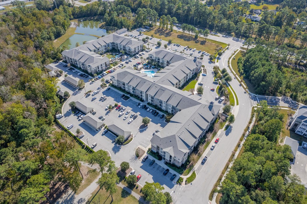 an aerial view of a city with buildings and trees