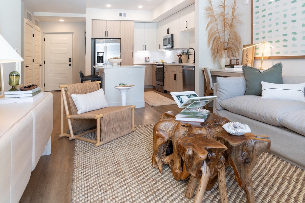 a living room with a couch and a table