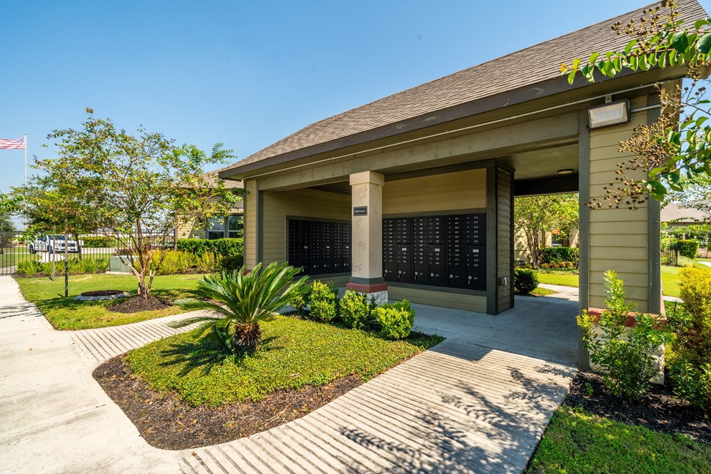 the preserve at ballantyne commons community clubhouse with walkway and grass