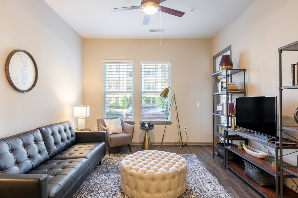 a living room with a couch and a tv