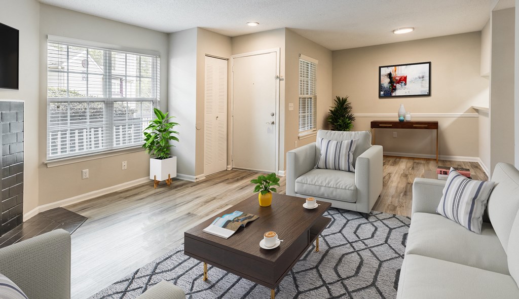 a living room with two couches and a coffee table