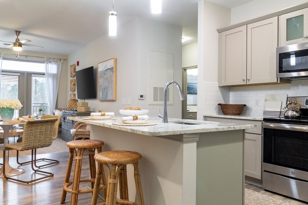 Custom Designed Kitchen with Stainless Steel Appliances