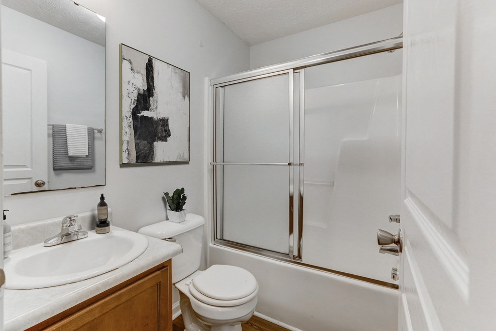 Apartment home bathroom with shower and sink