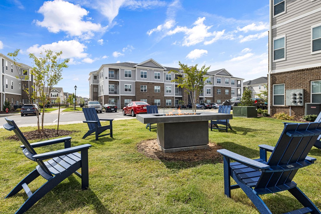 the preserve at ballantyne commons courtyard with fire pit and chairs