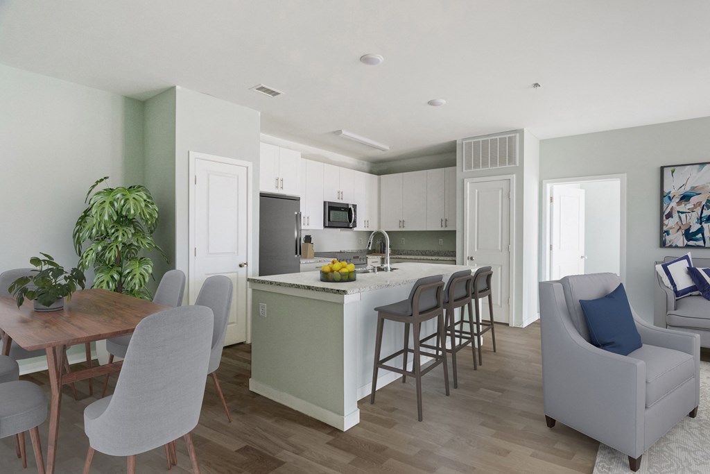 an open kitchen and dining area with a dining table and chairs