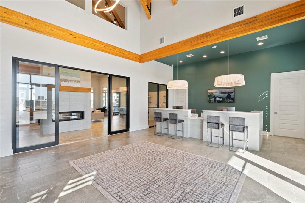 a large living room with a dining room and a kitchen