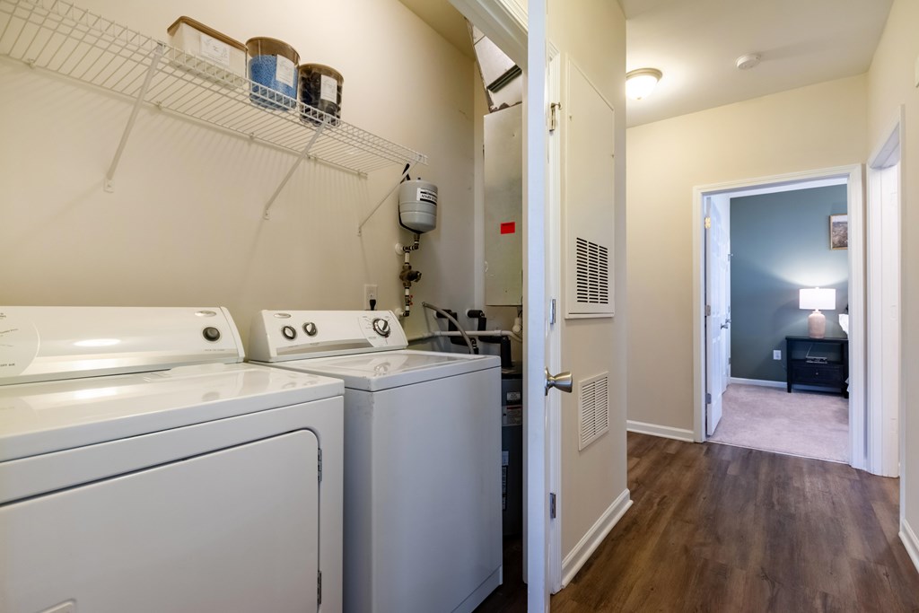 A laundry room with a washer and dryer.