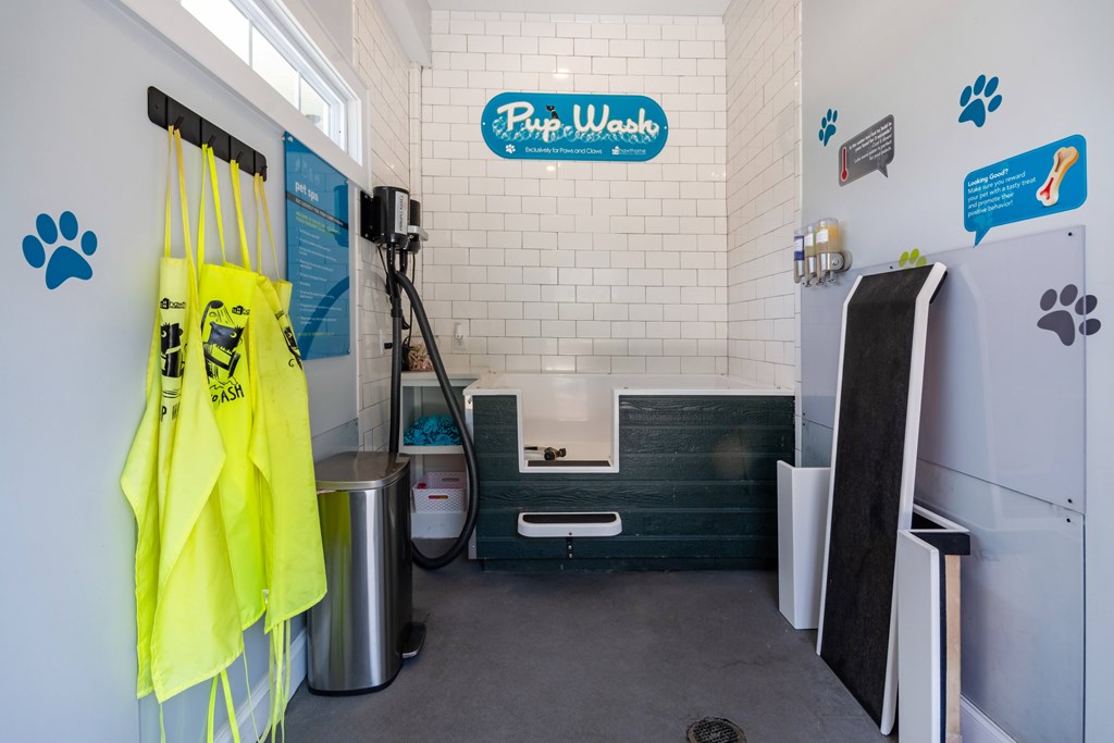 A bathroom with a sign that says